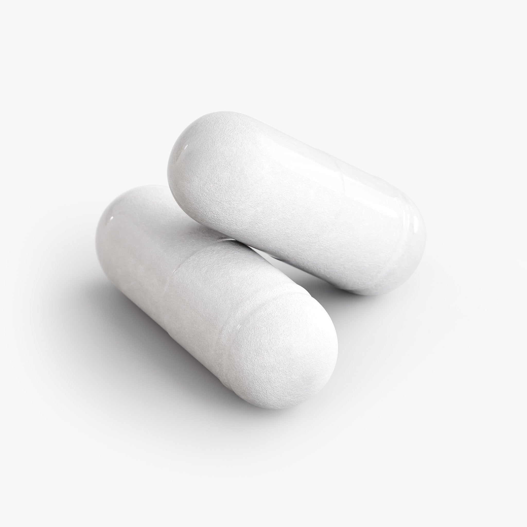 Two loose capsules of Beau Wellness Bone and Heart Support Capsules with Vitamin D3, K2, and Calcium⁠ on white background.
