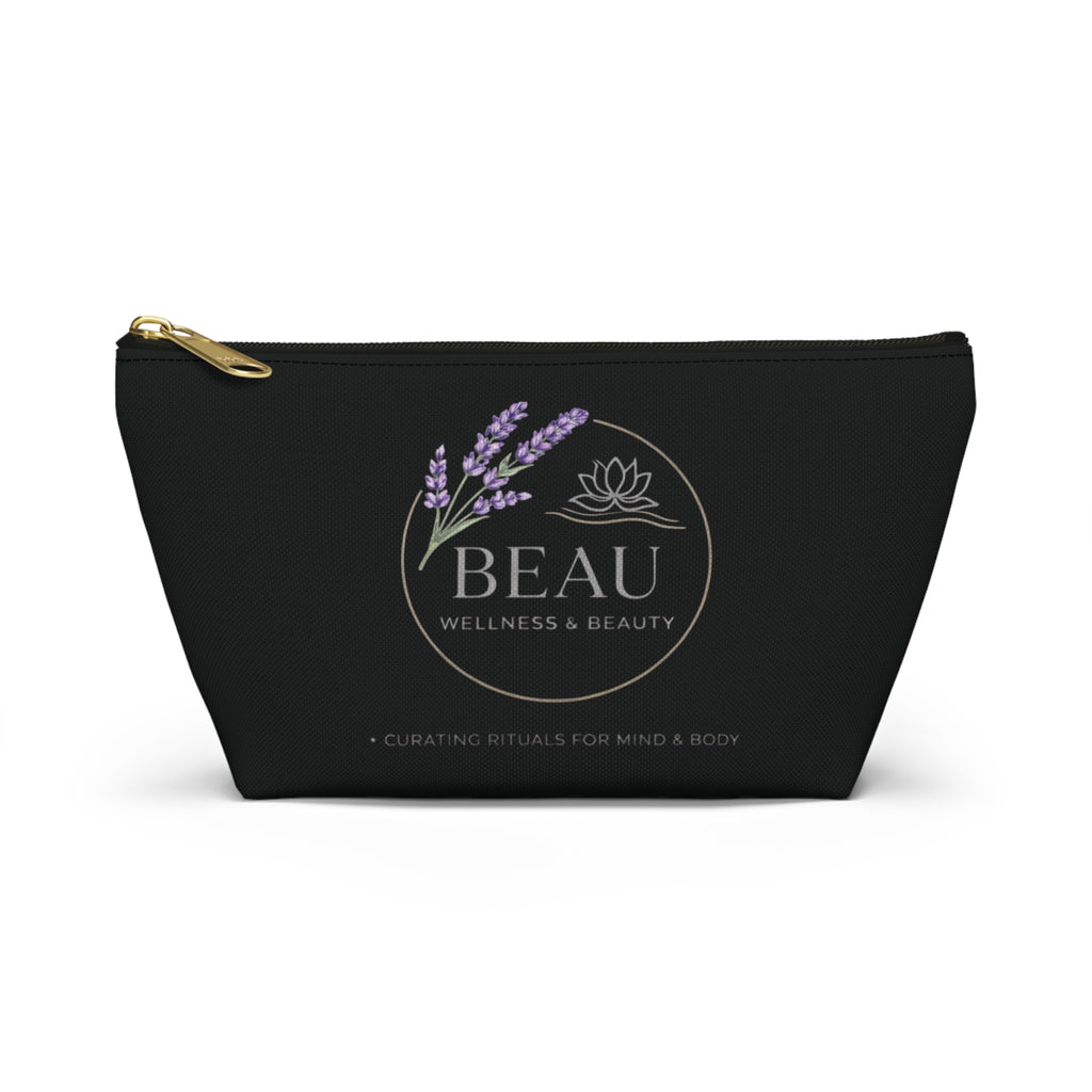 Black cosmetic travel pouch with 'BEAU Wellness & Beauty' logo on a white background