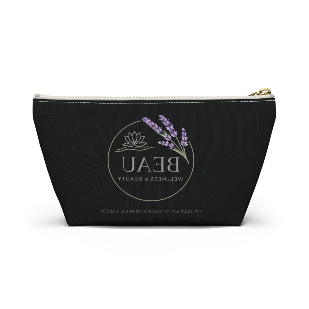 Black Travel Pouch with 'BEAU' branding and lavender design on a white background