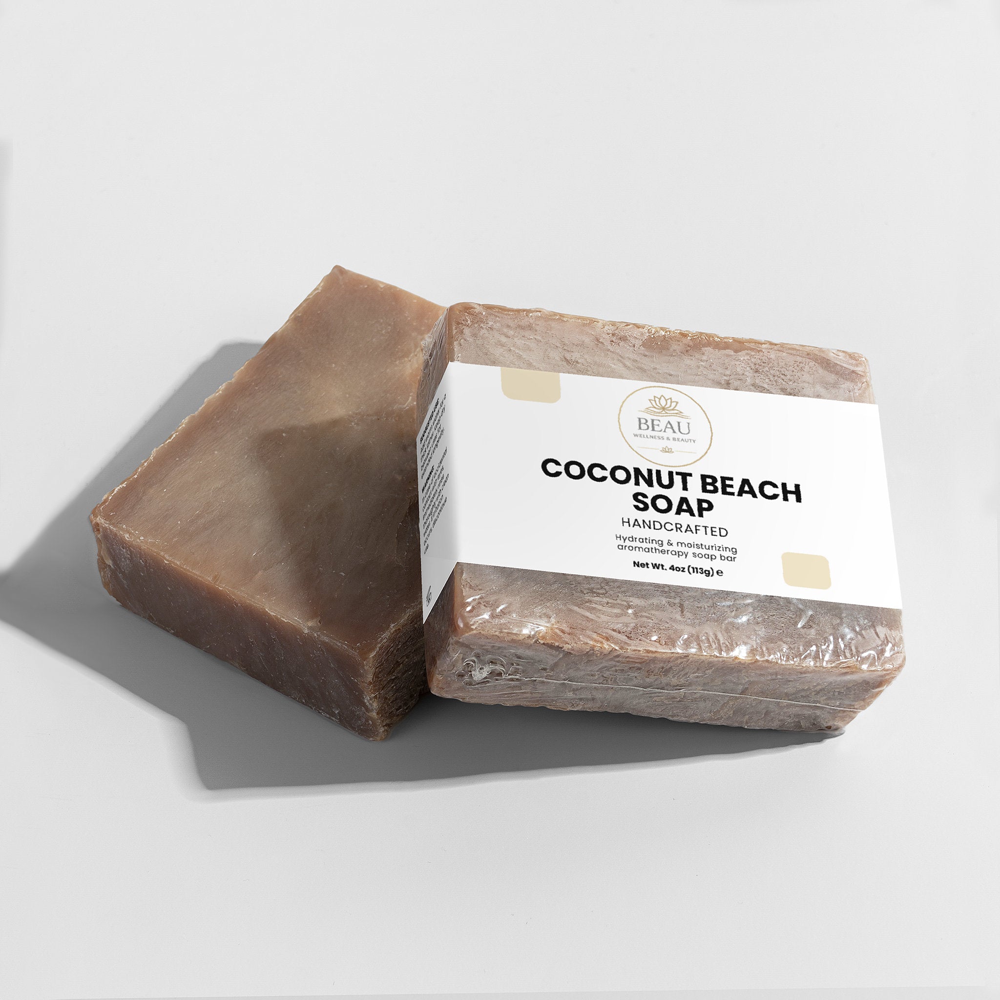 Coconut Beach Soap handcrafted hydrating  bar with a label on a light gray background
