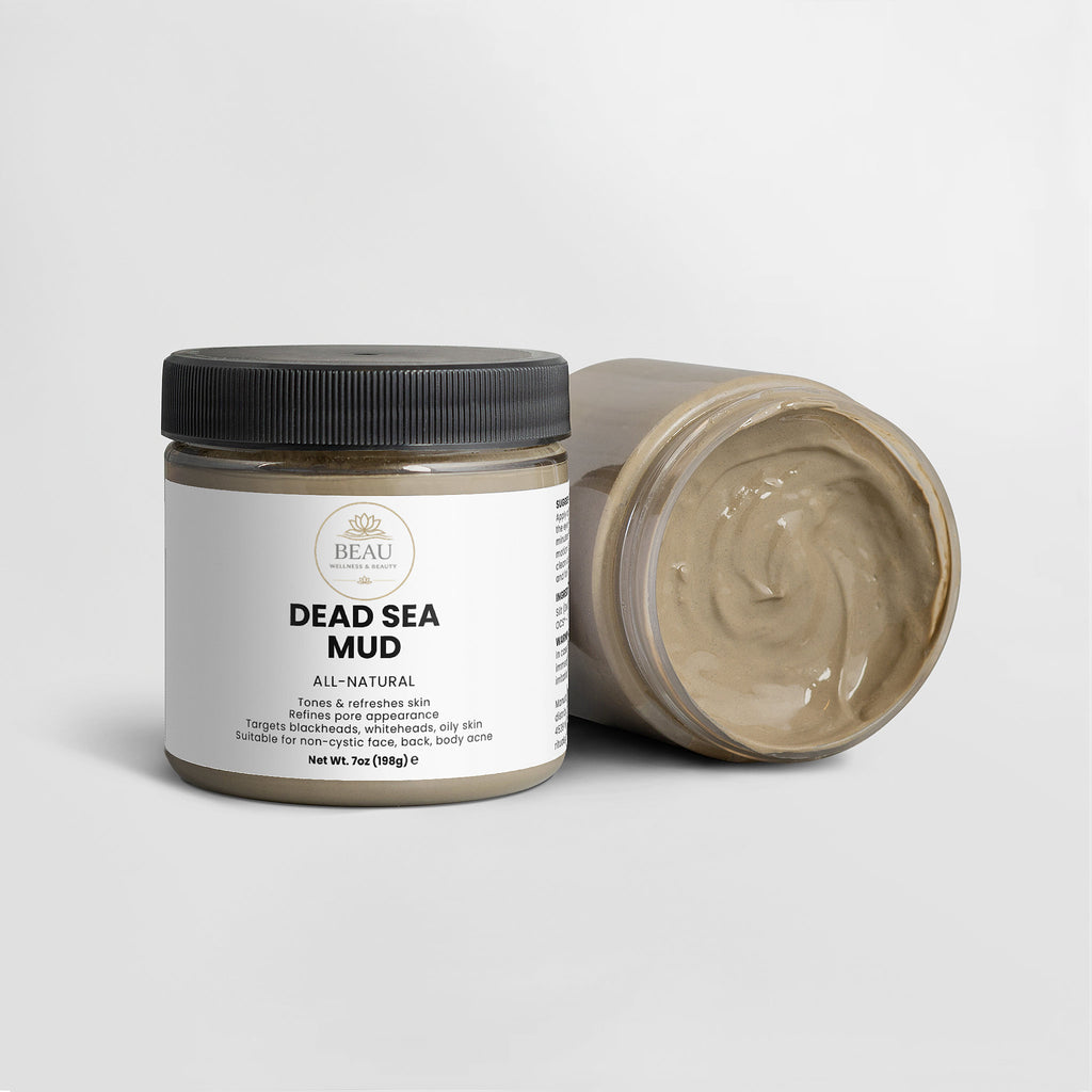 Jar of Dead Sea Mud with a black lid on a white background