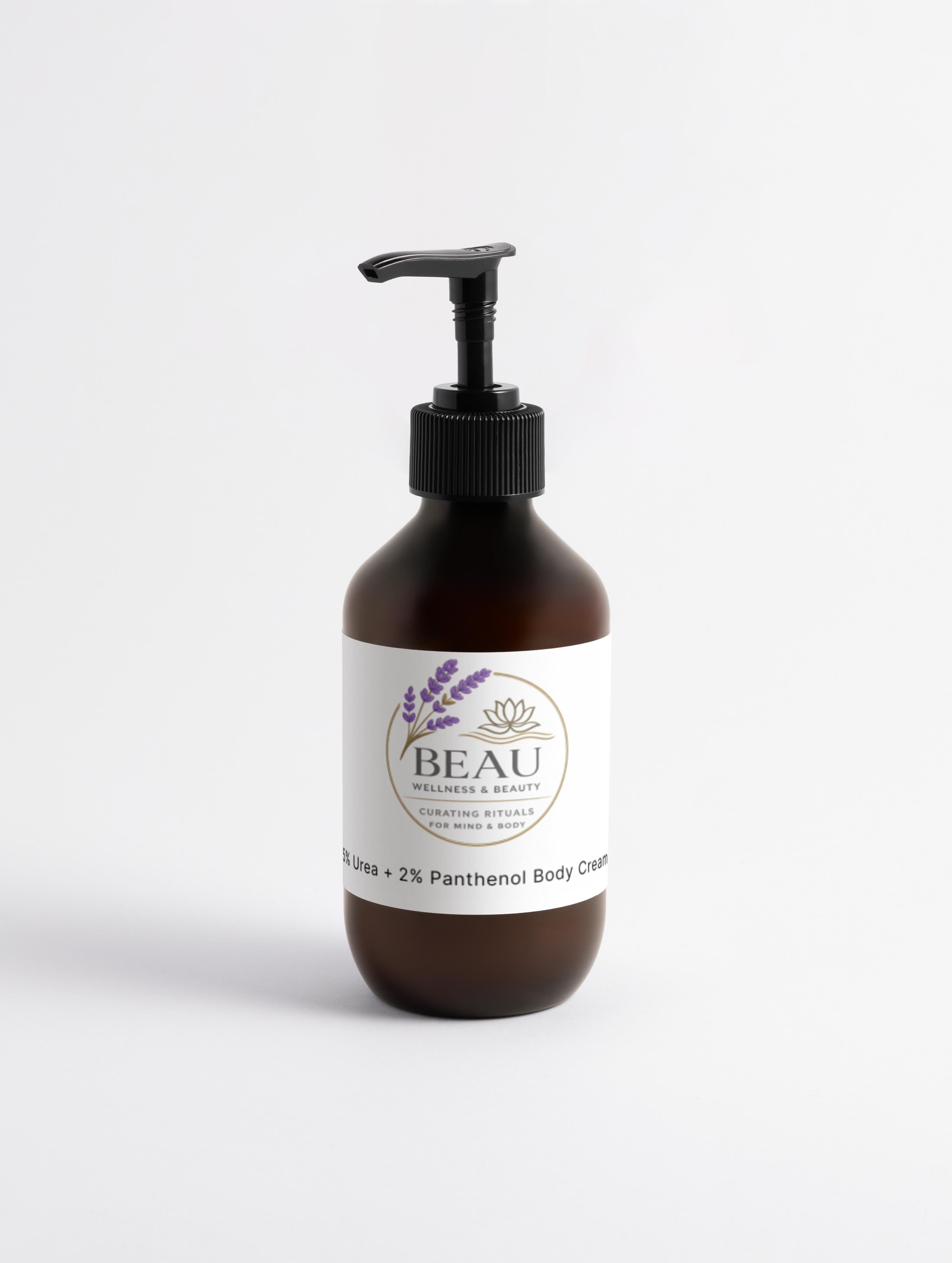 Minimalist amber pump bottle of Beau Wellness & Beauty 5% Urea + 2% Panthenol Body Cream on a clean white background