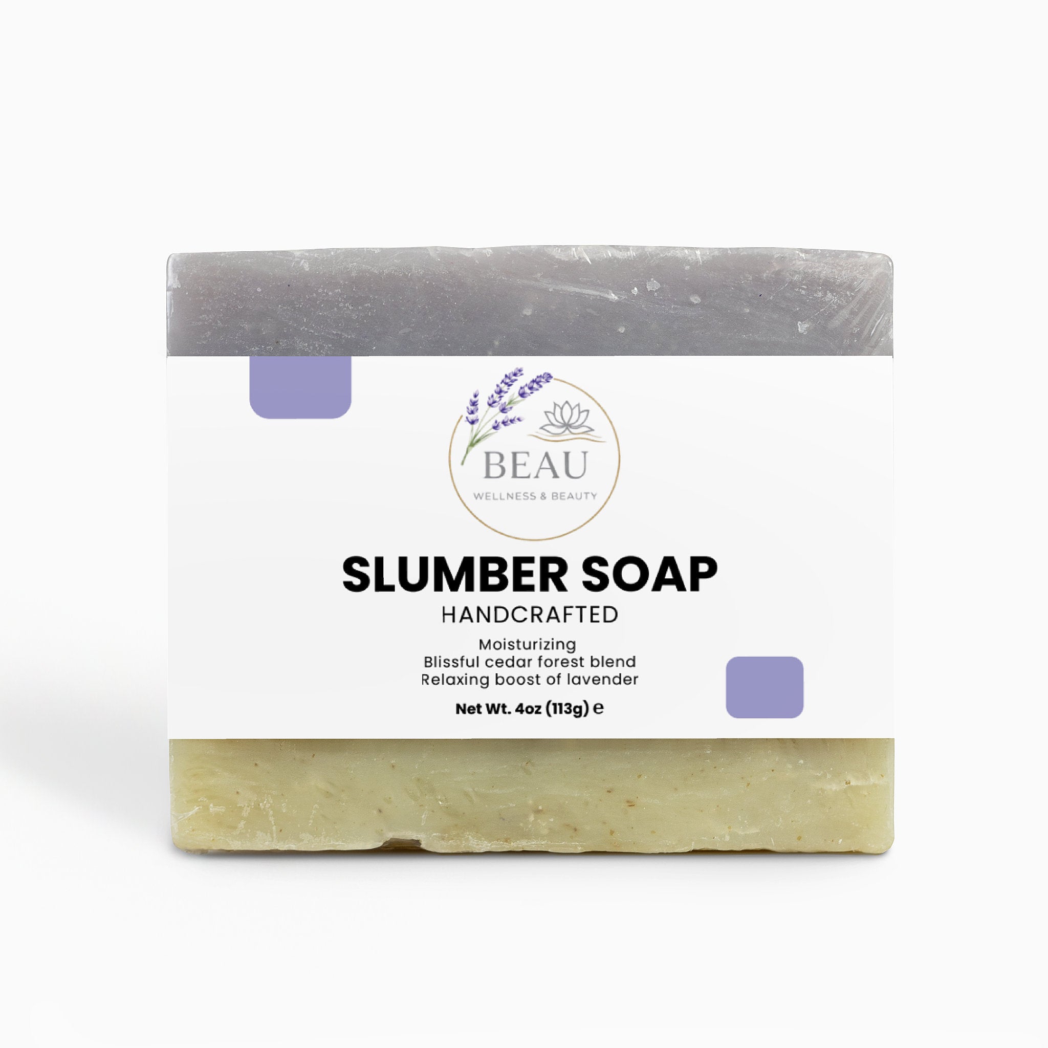 Handcrafted Bar of cedar and lavender soap with packaging labeled 'Slumber Soap' by 'BEAU Wellness & Beauty' on a white background