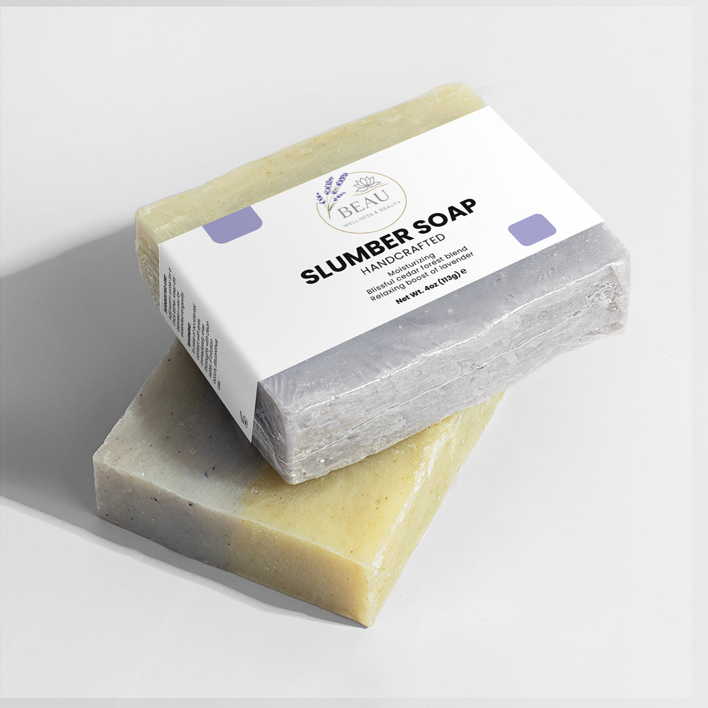 Two handcrafted bars of Slumber soap with a 'Beau Wellness & Beauty' branded box on a white background