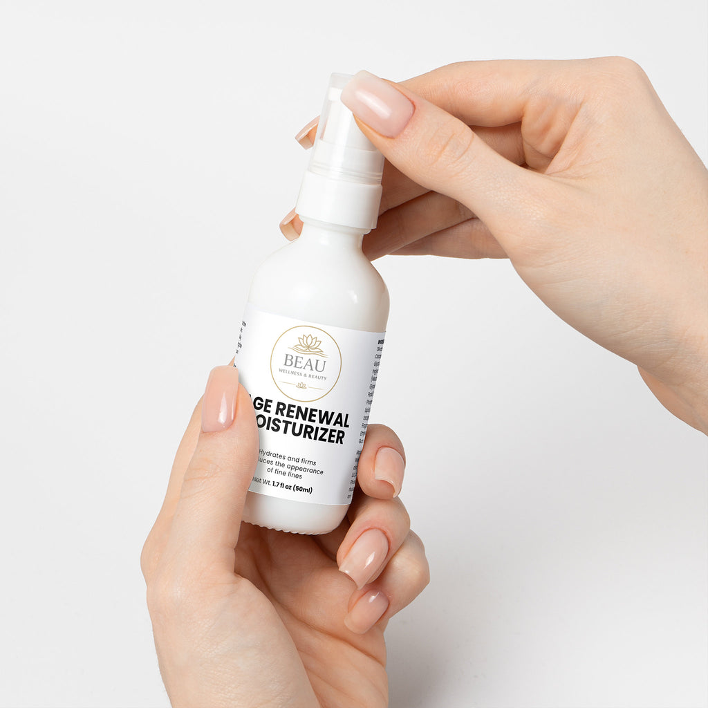 Beau Wellness and Beauty Anti-Aging Moisturizer. A luxury, cruelty-free, and alcohol-free cream with Retinol, Peptides, and Ceramides for mature skin nutrition. Held by two hands on white background.
