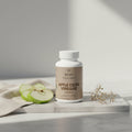Three bottles of Beau Wellness Apple Cider Vinegar capsules on a white background