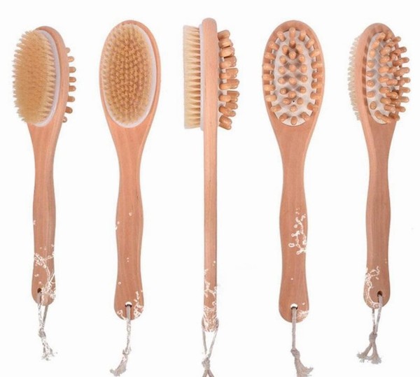 Dual-sided wooden bath brush with natural boar bristles for exfoliation and wooden massage nodules for circulation.