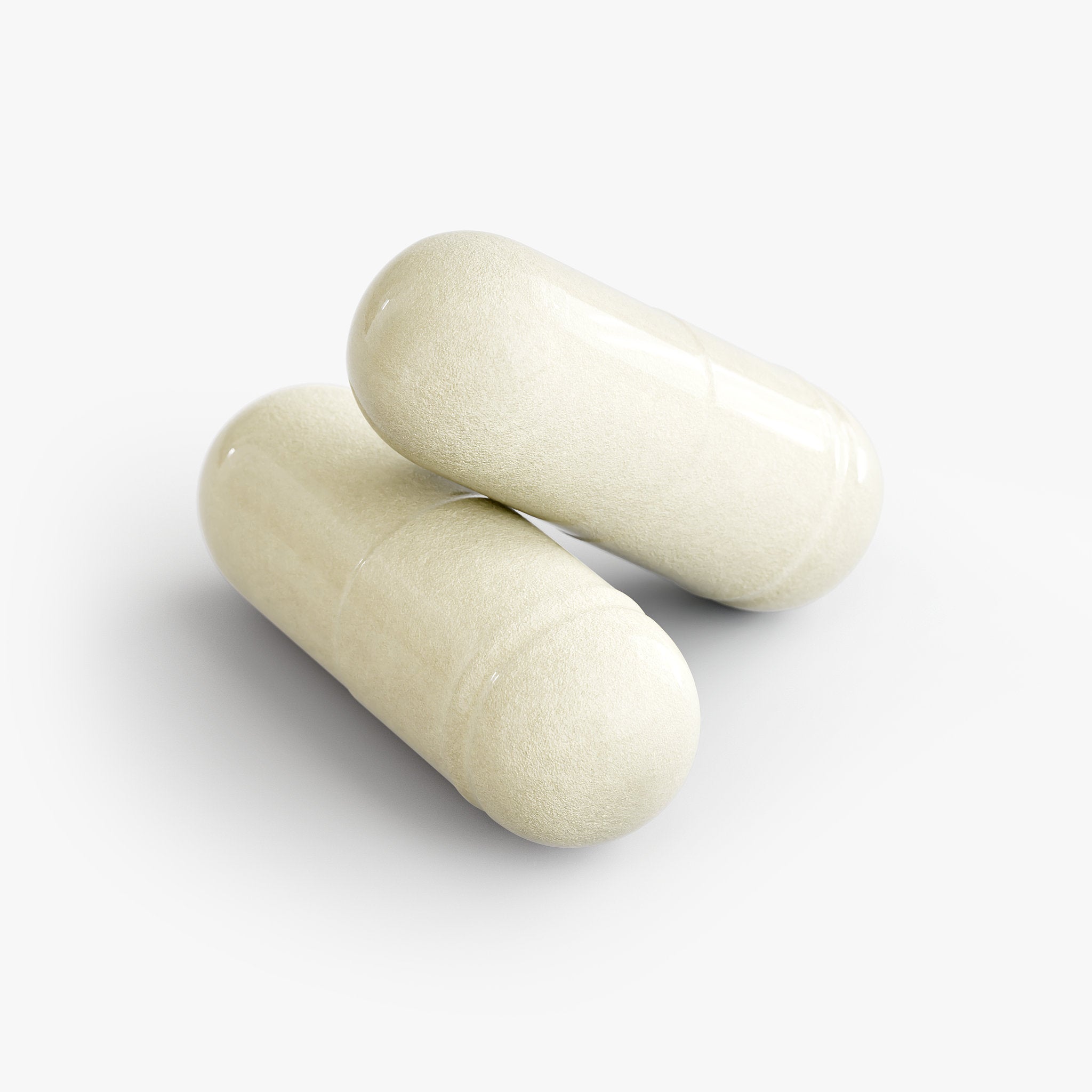 Two loose capsules of Beau Wellness Digestive Enzyme Pro Blend Vegan Capsules with Makzyme-Pro and Probiotics⁠ on white background.