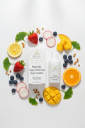 BEAU Peptide Age-Defying Eye Cream shown with its white retail box and matching white pump bottle on a clean light white background surrounded by fruits