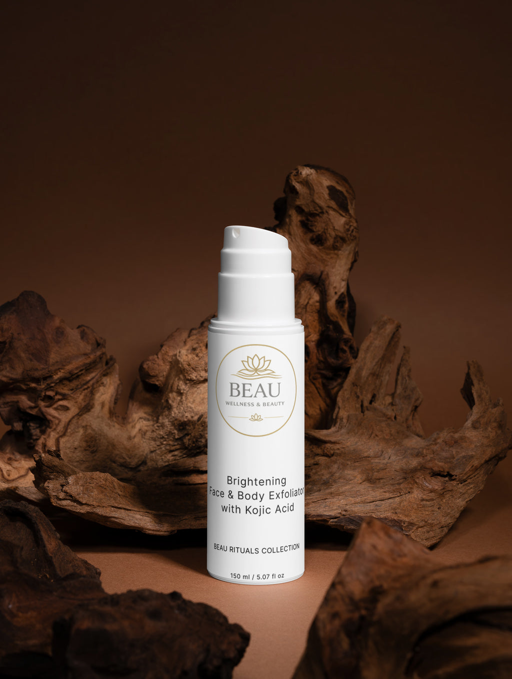 Beau Wellness & Beauty Brightening Face & Body Exfoliator with kojic acid on a wooden background. 