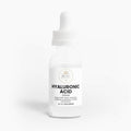 A glass bottle of Beau Wellness & Beauty Hyaluronic Acid Serum with a white dropper cap, featuring a clean label that highlights deep multi layer hydration for a youthful-looking complextion