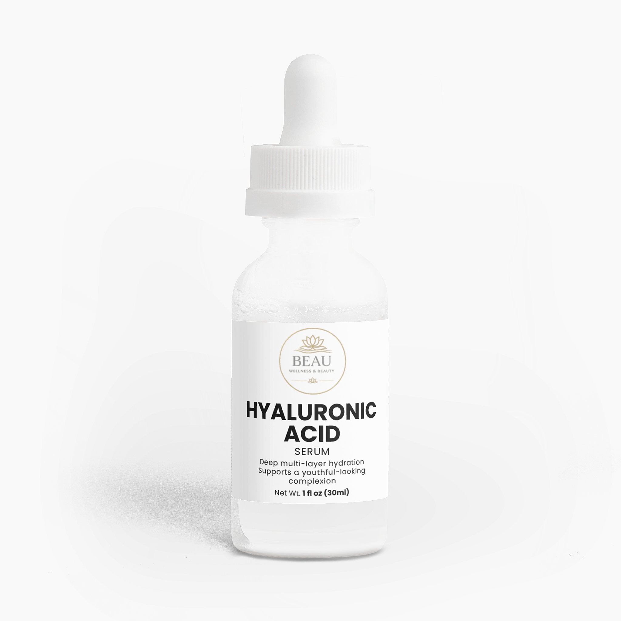 A glass bottle of Beau Wellness & Beauty Hyaluronic Acid Serum with a white dropper cap, featuring a clean label that highlights deep multi layer hydration for a youthful-looking complextion