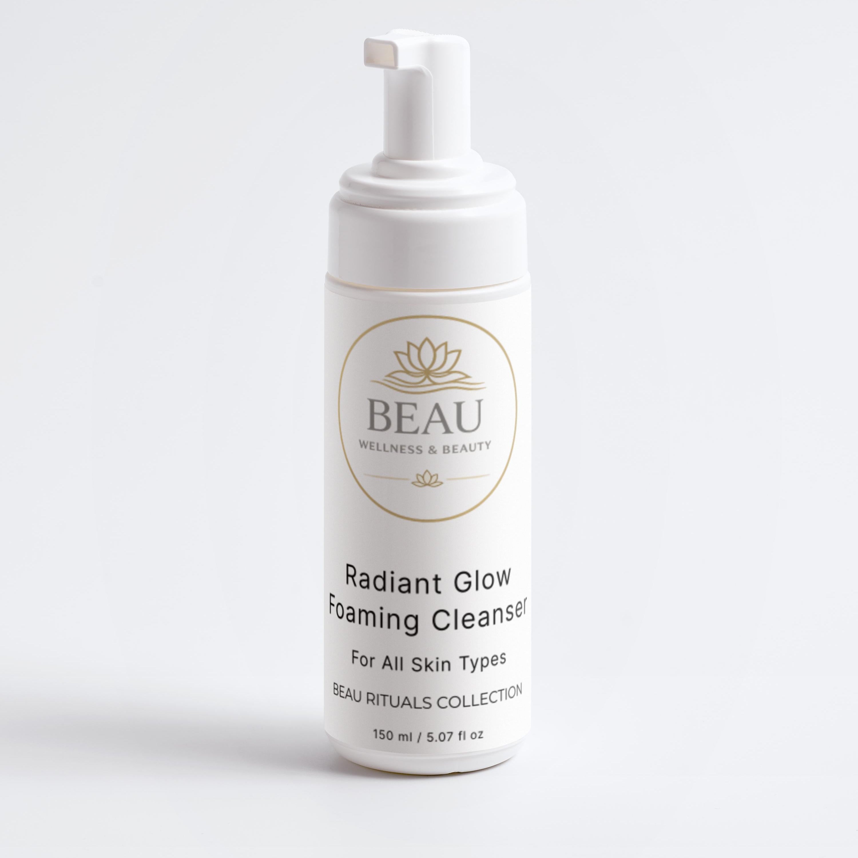 Foaming cleanser bottle labeled 'BEAU' Wellness & Beauty on a white background