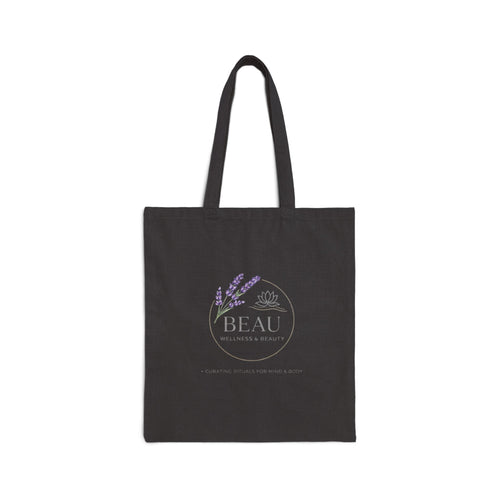 Black Canvas tote bag with 'BEAU Wellness & Beauty' logo on a white background