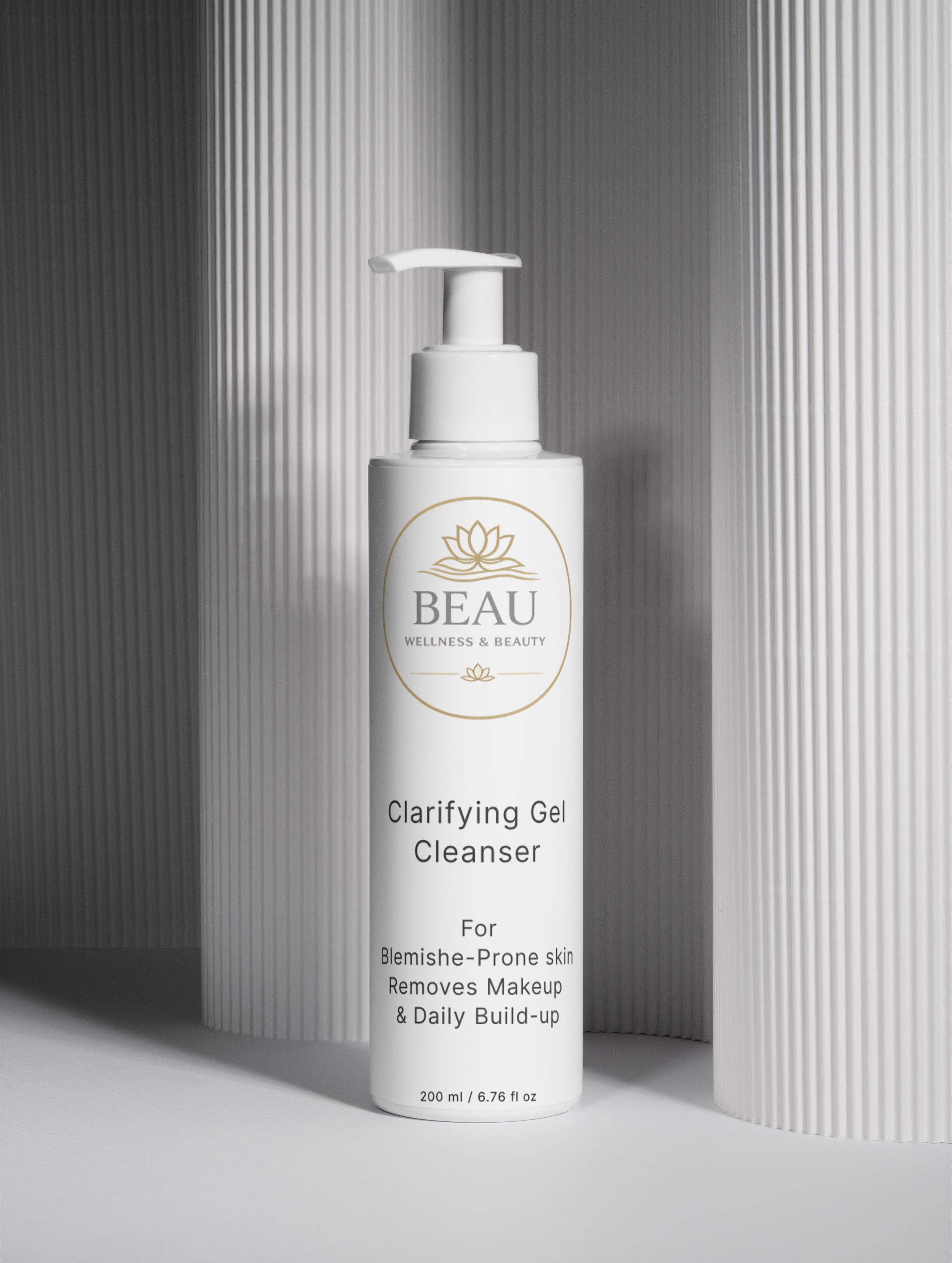 White bottle of Beau Wellness & Beauty Clarifying Gel Cleanser for blemishes and makeup removal with pump on a gray background