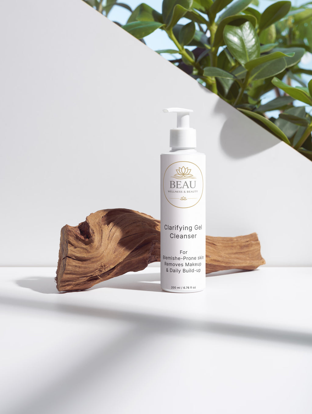 Beau Wellness & Beauty Clarifying Gel Cleanser skincare product for blemish-prone skin and makeup removal on a white surface with natural elements