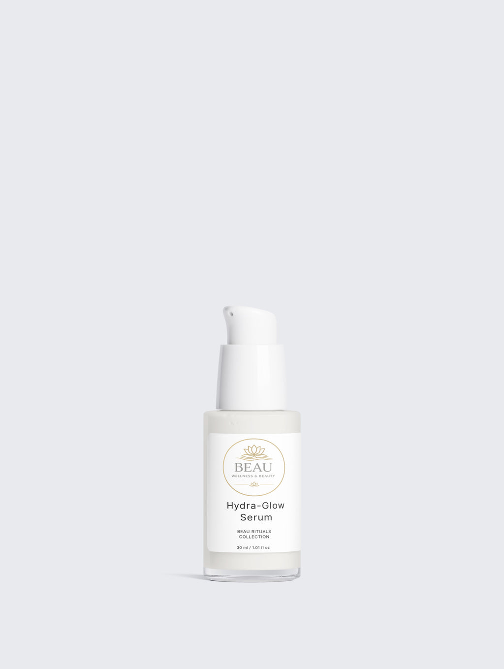 A clear glass bottle of BEAU Wellness & Beauty Hydra-Glow Serum with a white pump dispenser and a white label, centered against a solid light gray background.