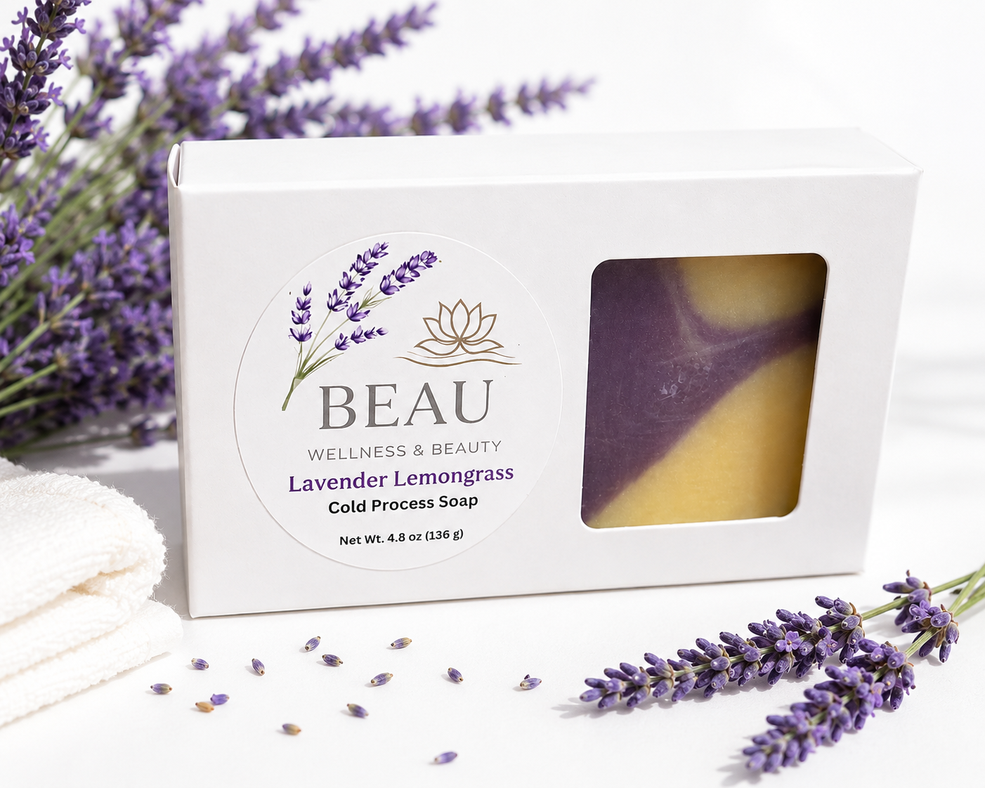 Box of BEAU Wellness & Beauty Lavender Lemongrass handcrafted cold process soap in packaging with lavender flowers around