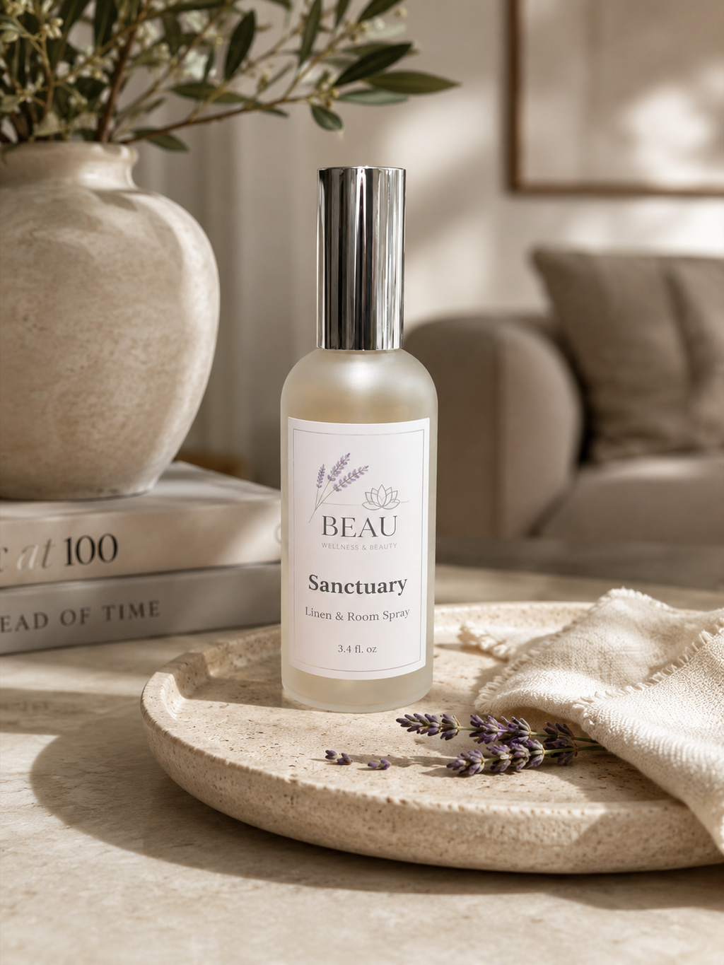 Beau Wellness & eauty Sanctuary Linen & Room Spray featuring notes of lavender, lemongrass, and white tea in a luxury home setting