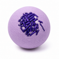 Handcrafted Sleep Ritual Lavender Bath Bomb formulated with nourishing shea butter and coconut oil for a relaxing nighttime bath routine.⁠ Color lavender with dark purple sprinkles

