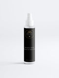 Bottle of Beau Keratin Shine Leave-In Hair Mist on a white background