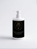 Beau Wellness & Beauty Keratin Volume Boost Conditioner in a white pump bottle, formulated with rosemary oil and caffeine for thinning hair.