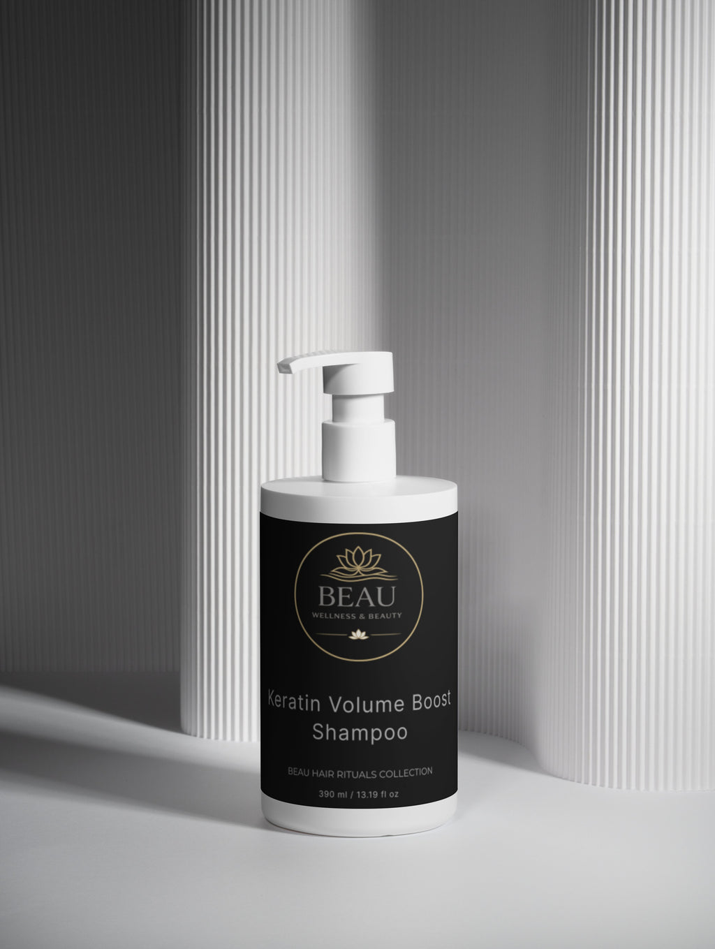 Keratin Volume Boost Shampoo by Beau Wellness & Beauty in minimalist white bottle with black label”


