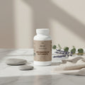 Three bottles of Magnesium Supplements on a white background