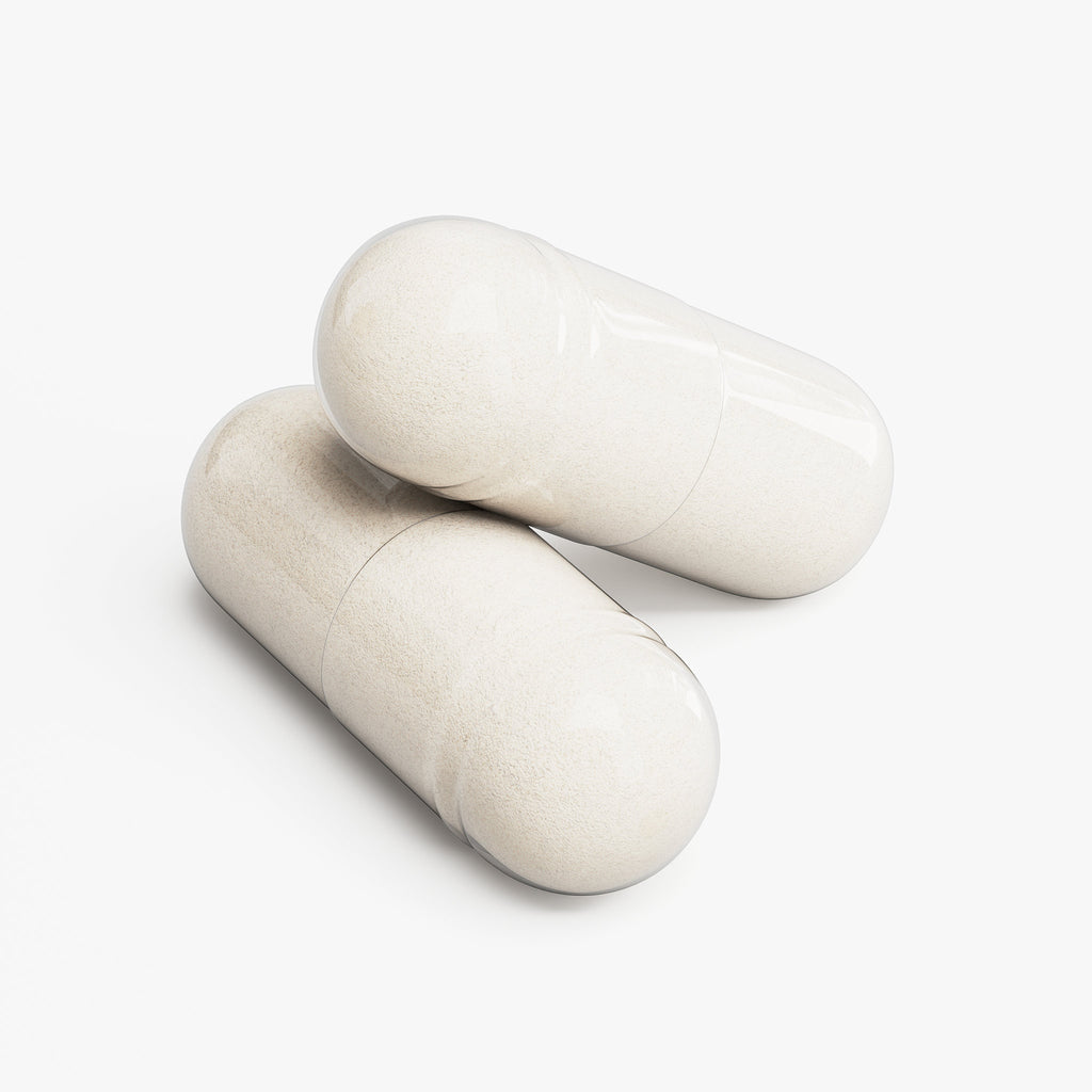 Two stacked capsules of Beau Wellness Nitric Oxide with L-Arginine and L-Citrulline on white background.