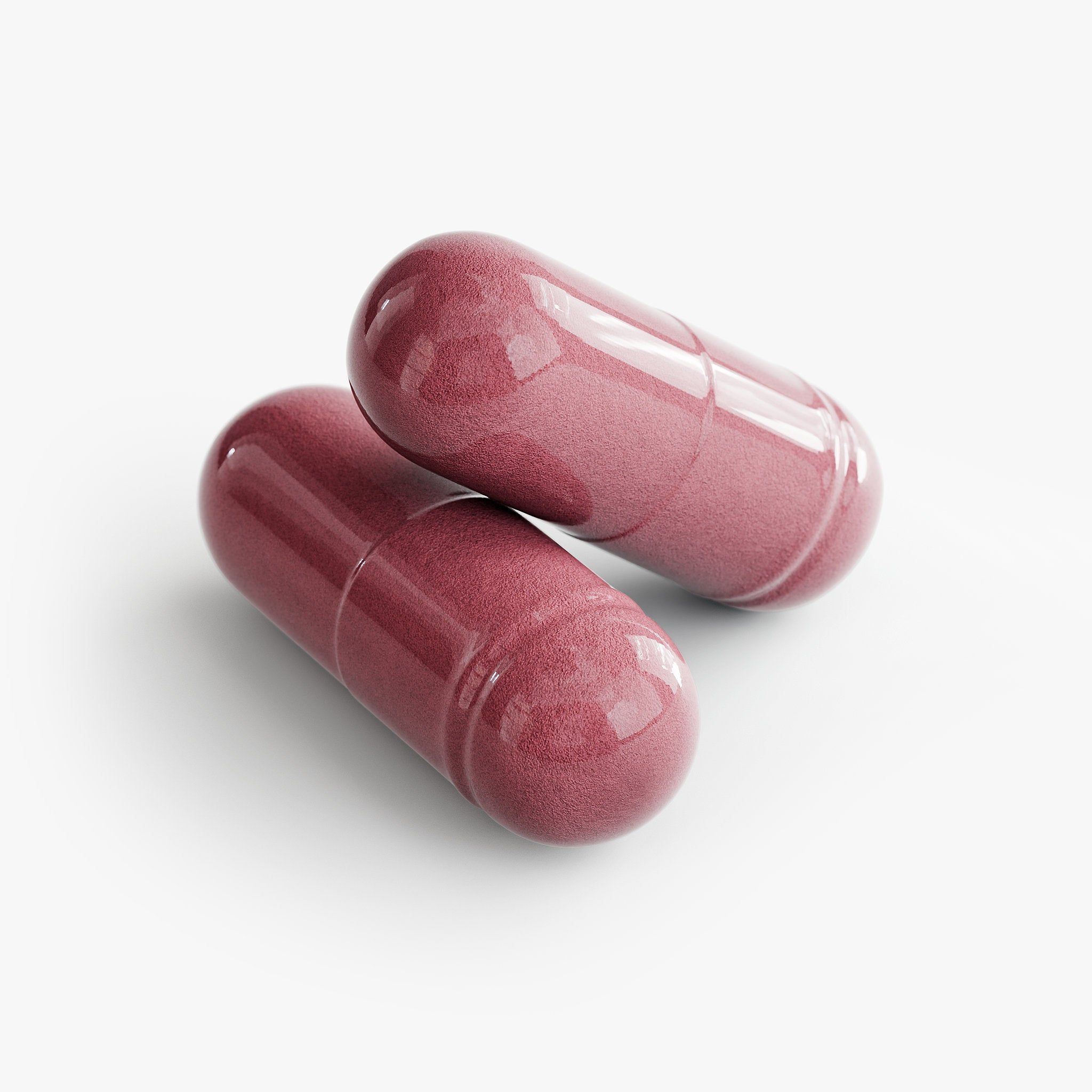two capsules of Beau Wellness Organic Beet Root 1300mg for cardiovascular health, natural nitric oxide booster, blood flow, and athletic endurance support."