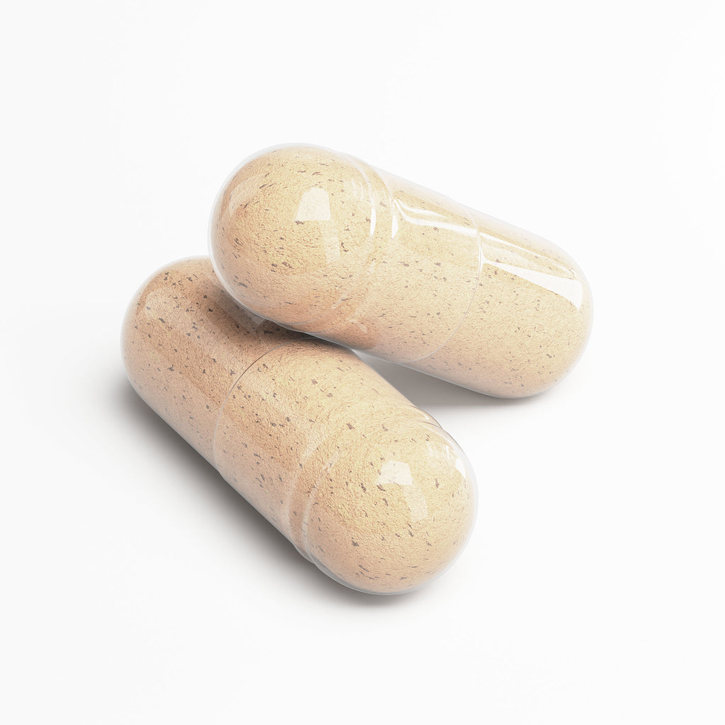 Two beige Ox Bile Complex capsules with DigeZyme and Artichoke Extract for healthy fat digestion and gallbladder support on white background.