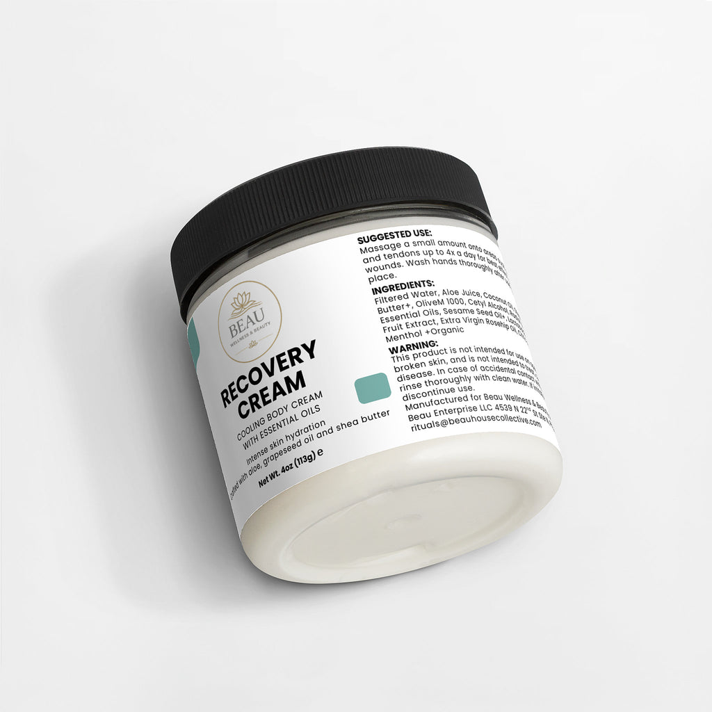 Jar of recovery cream cooling body cream with essential oils with black lid on a white background
